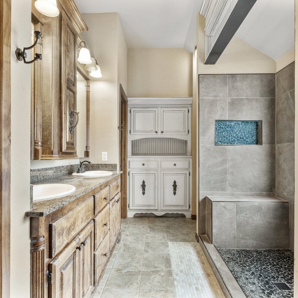 Rustic bathroom with custom vanity and walk-in shower
