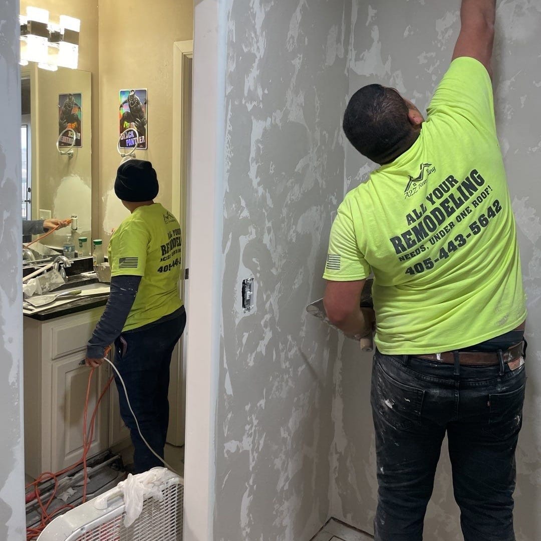 A2Z crew applying wall texture