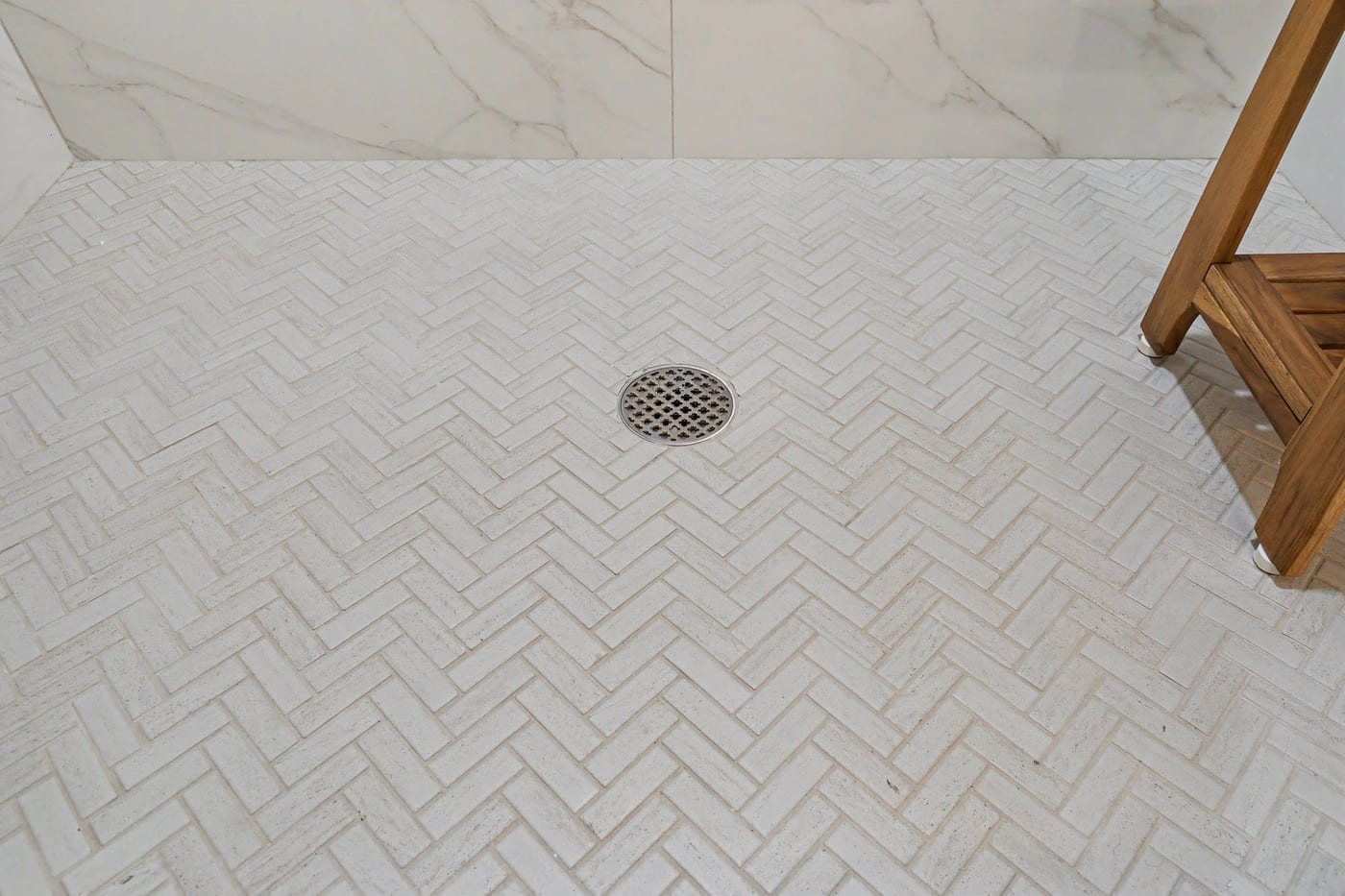 Herringbone tile shower floor